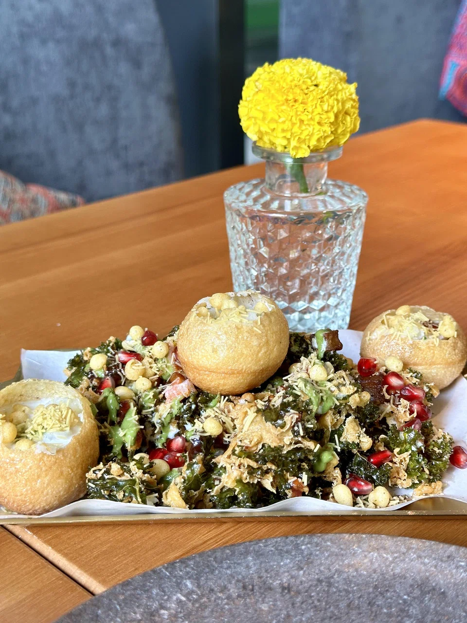 Deep-fried crispy kale salad is paired with gol gappa puri chaat.