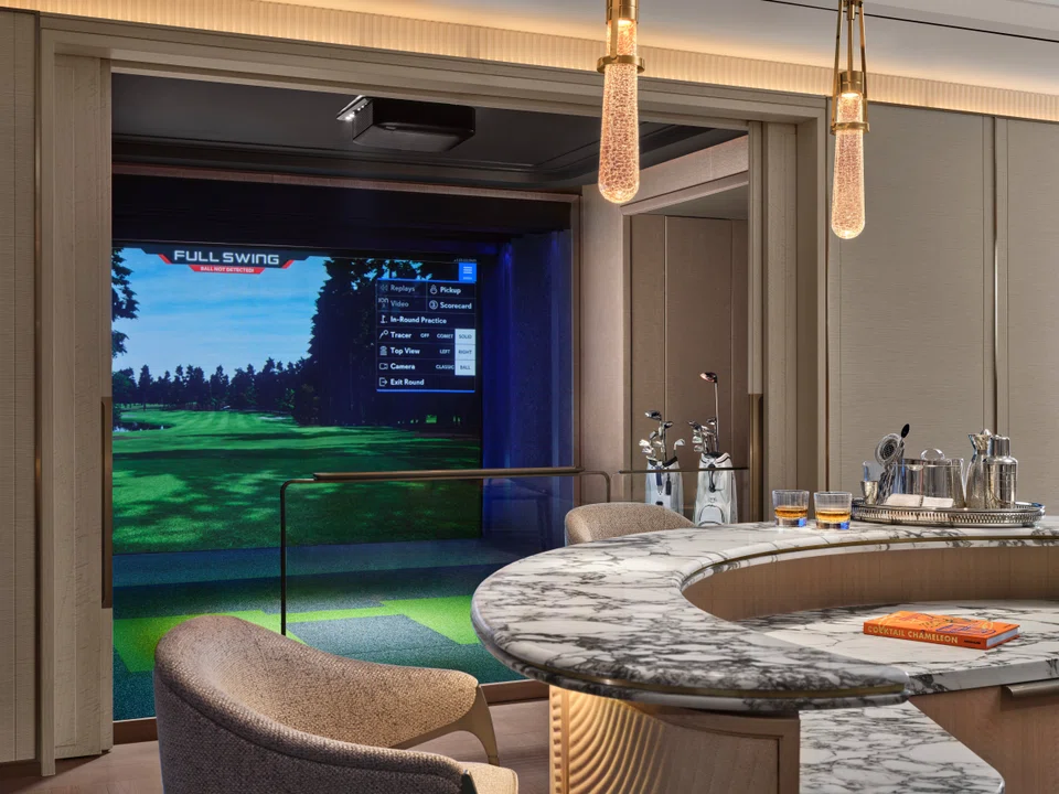The Presidential Suite at MBS has a golf simulator for guests to practise their swing.