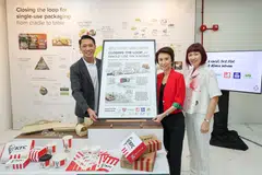 (From left) Ng Pei Kang, CEO of TRIA, Low Yen Ling, Minister of State for Trade and Industry, and Lynette Lee, general manager of KFC Singapore at the launch of the pilot programme between Singaporean startup TRIA and KFC Singapore which will implement a circular recycling model for single-use packaging. 