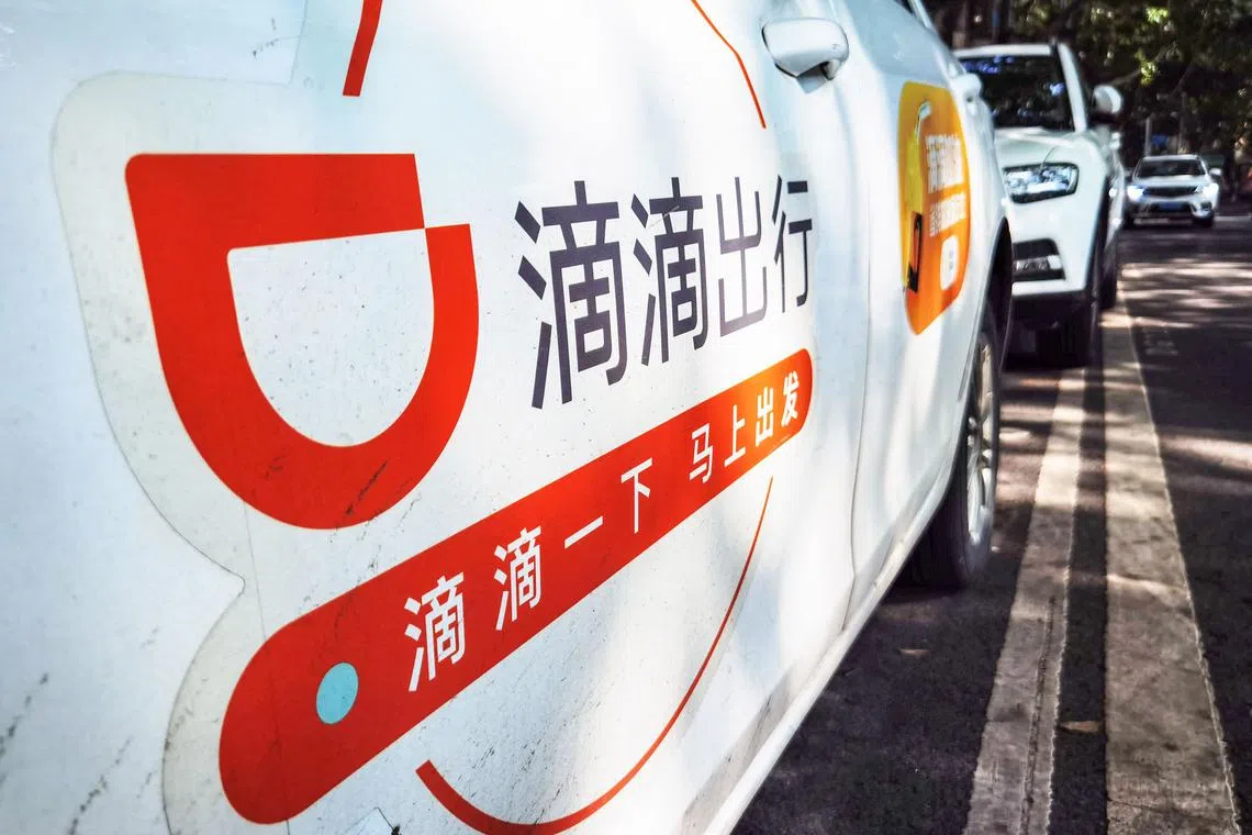 A logo of China's ride-hailing giant Didi. China has fined ride-hailing giant Didi more than 1.2 billion USD, after a year-long investigation into alleged data security violations. (Photo by AFP) / China OUT