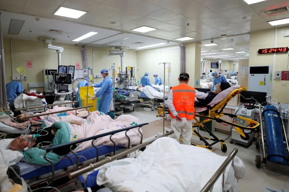 Chinese hospitals and funeral homes were under intense pressure as a surge of new Covid-19 cases drained resources. 