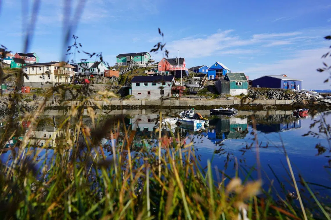 The island, whose capital Nuuk (top) is closer to New York than the Danish capital Copenhagen, boasts mineral, oil and natural gas wealth.