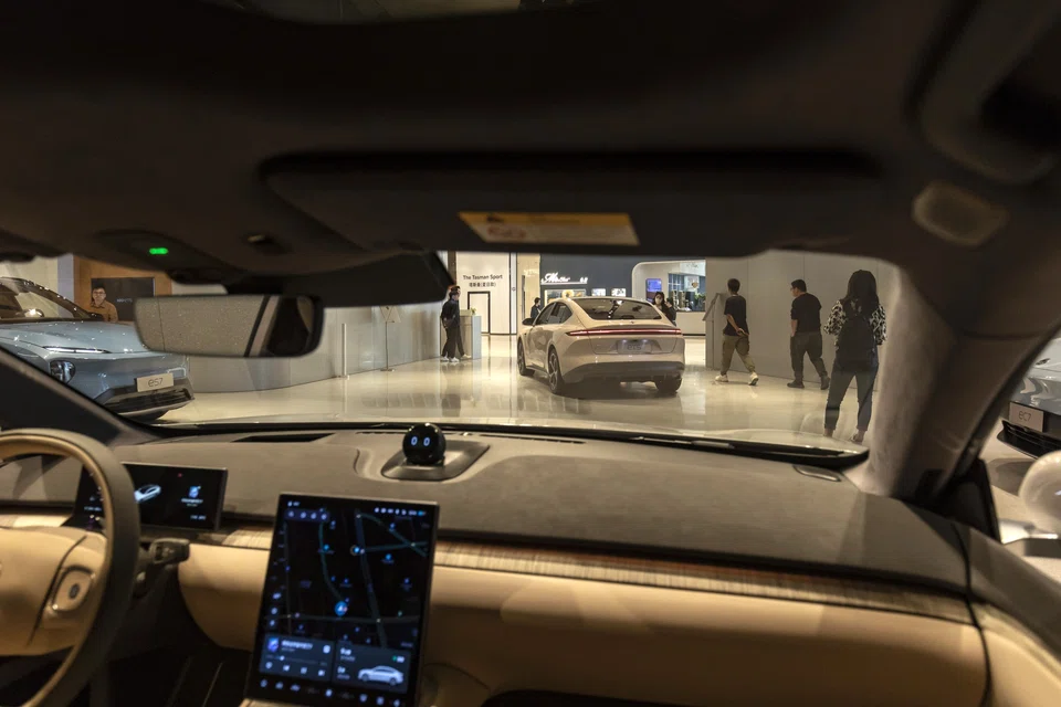 Buyers who trade in an old car for a new EV or plug-in hybrid will receive a 20,000 yuan subsidy.