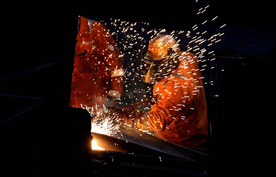 Workers work at the British Steel site in Scunthorpe, Britain, April 17, 2025. Britain said it could export up to 27,000 tonnes of steel to the EU each quarter without paying an extra tariff under the arrangement.