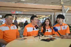 (From left) NSP members Raiyian Chia, Spencer Ng – who is the party’s secretary-general, Kevryn Lim and Zee Phay speaking to the media at Woodlands Mart on April 12.