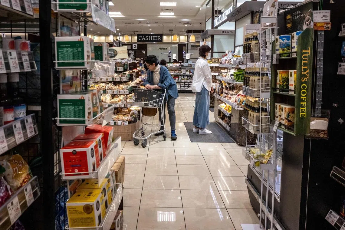 People shop in a supermarket in Tokyo, Japan, May 23, 2025. Japan's core inflation rate accelerated in April to 3.5 percent as rice prices almost doubled year-on-year, official data showed. 