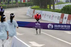 The winning robot, developed by Chinese smartphone brand Honor, finished the race in 50 minutes and 26 seconds.