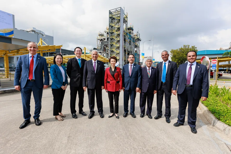 Sabic's new manufacturing facility was officially opened by Senior Minister of State for Trade and Industry Low Yen Ling (centre, in red). To her immediate right is Sabic’s chief executive officer Abdulrahman Al-Fageeh.  