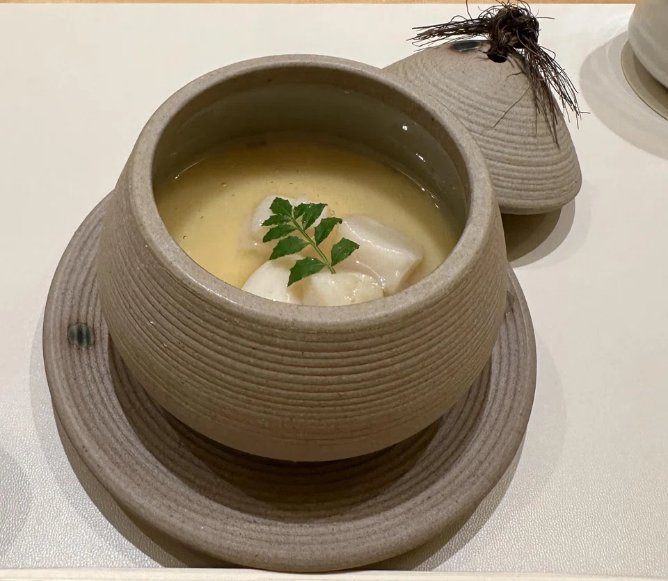 Chawanmushi is studded with chunks of scallop.