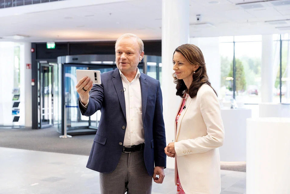 Nokia CEO Pekka Lundmark makes an immersive phone call, with Nokia Technologies president Jenni Lukander, at Nokia headquarters in Espoo, Finland. 