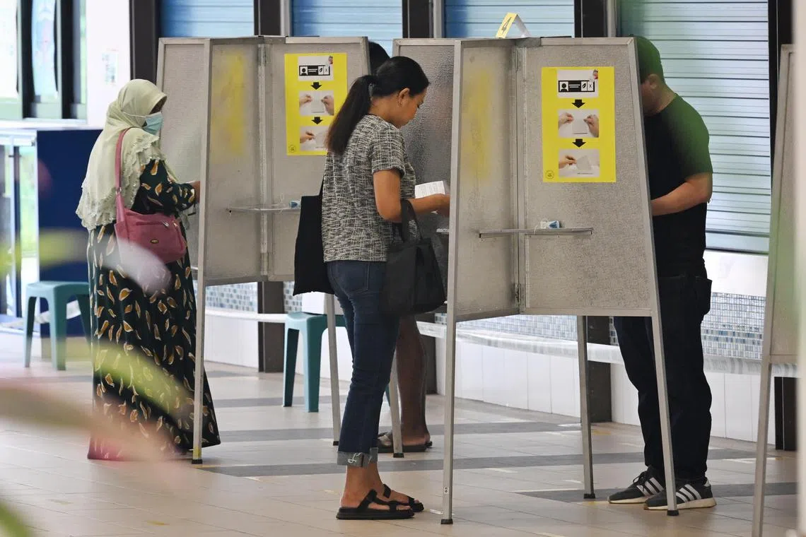 Voters casting their ballots at the polling station at Waterway Primary School on September 1, 2023.