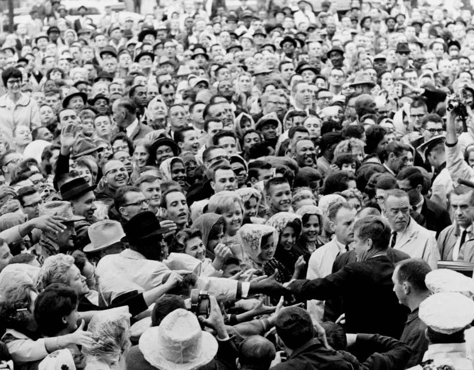  President John F. Kennedy greets a crowd at a political rally in Fort
Worth, Texas several hours before his assassination, Nov 22, 1963.