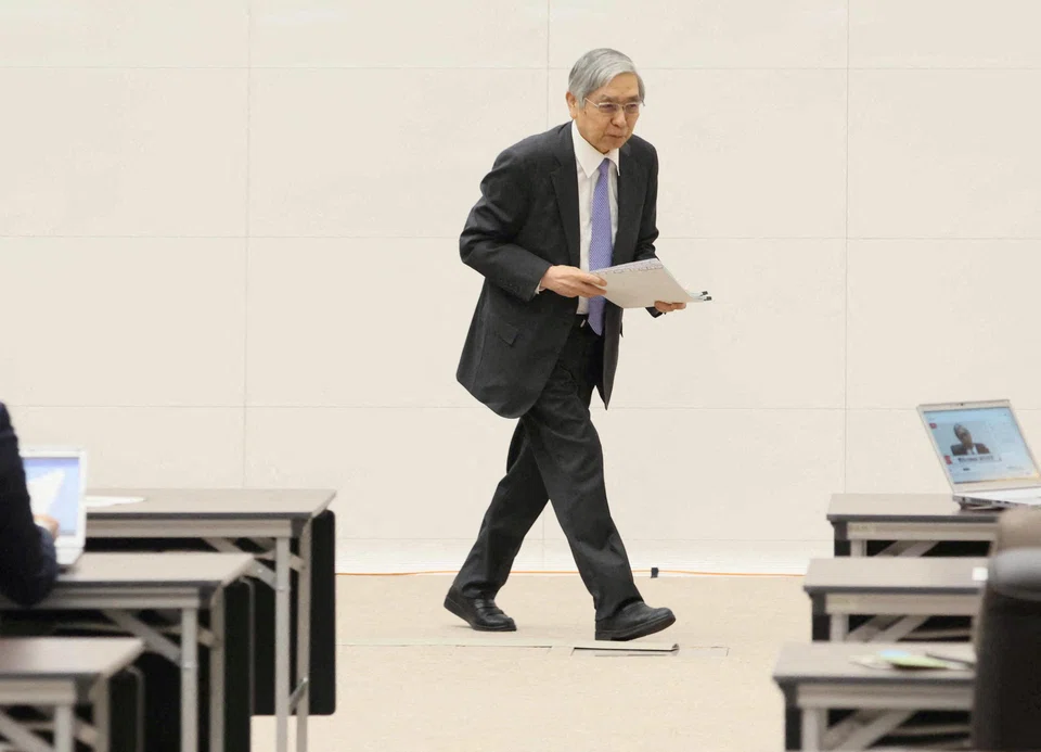 The review warned that the negative effects of former governor Haruhiko Kuroda’s massive monetary stimulus  may last longer than expected and become bigger in the future.