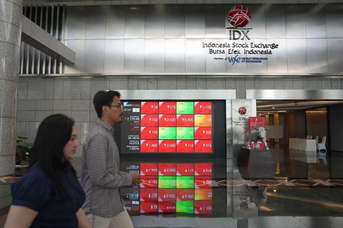 A screen displays share prices at the lobby of the Indonesia Stock Exchange (IDX) in Jakarta, Indonesia, on Monday, Sept. 1, 2025. A selloff in Indonesian stocks and bonds continued on Monday, as concerns grew over political stability in Southeast Asia’s biggest economy. Photographer: Dimas Ardian/Bloomberg