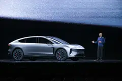 Nio founder and CEO William Li with the Nio ET9 in December 2023. He says that partnering with industry veterans such as Wearnes Automotive will enable Nio to introduce smart EVs to new markets more efficiently.