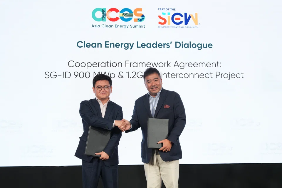 Sun Jinfeng, Singapore country manager of CRE International (left) and Frank Phuan, founder of Equator Renewables Asia.