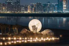 Kaw's massive Companion sculpture makes a splash at Souq Al Mina waterfront.