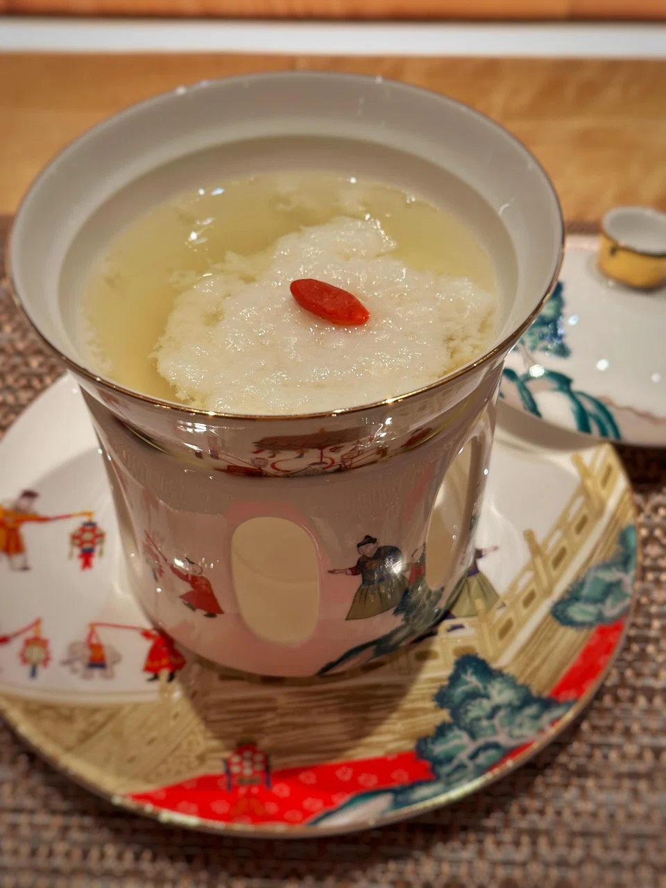 A delicate chicken consomme with a floating cloud of 'tofu' pudding that's made of chicken.