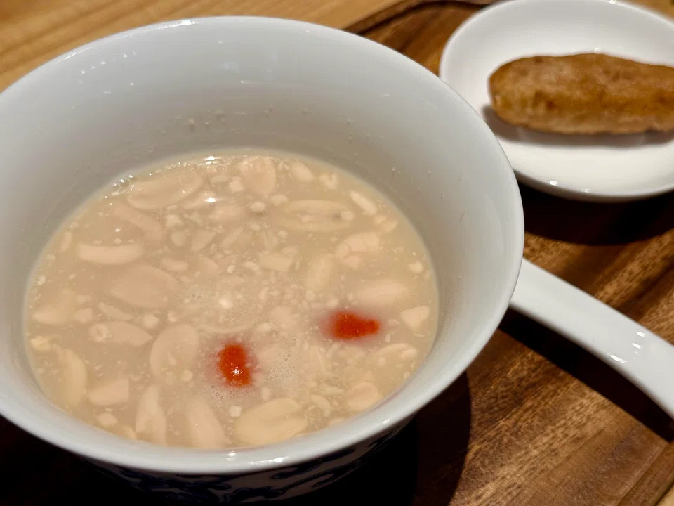 Peanut soup and cigar-shaped taro rolls.