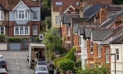 Above: Homes in Guildford, 44 km south-west of London. The average home value increased 0.3% to £272,998 in November, suggesting that the housing market is holding up.