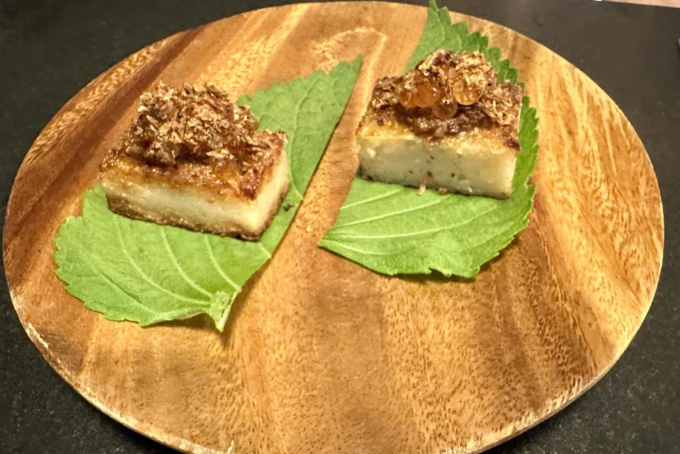 Mee sua kueh topped with XO sauce and ikura.