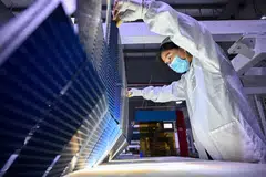 Photovoltaic modules for solar panels being made in a factory in China. European policymakers know that the green transition targets they have set will be impossible without Chinese electric vehicles, batteries and solar panels.