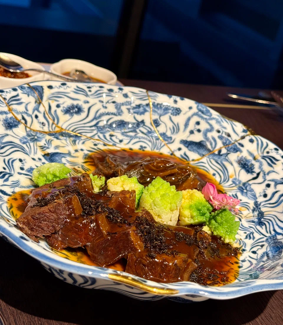 Braised Angus short ribs with preserved vegetables.
