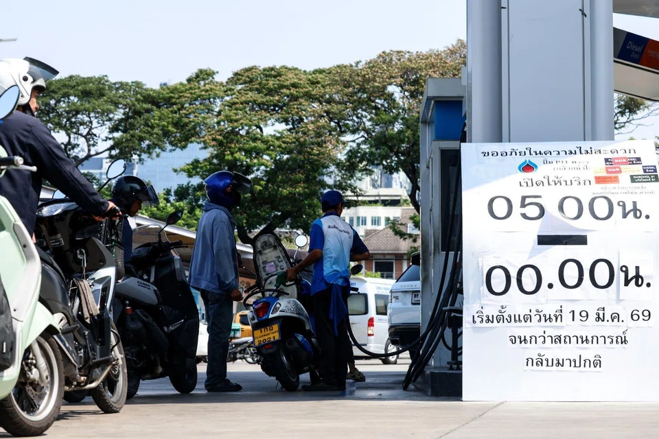 Above: A petrol station in Bangkok. Import-dependent economies such as Thailand and the Philippines have had to take drastic measures, such as subsidy cuts and export bans, to prevent a crisis.