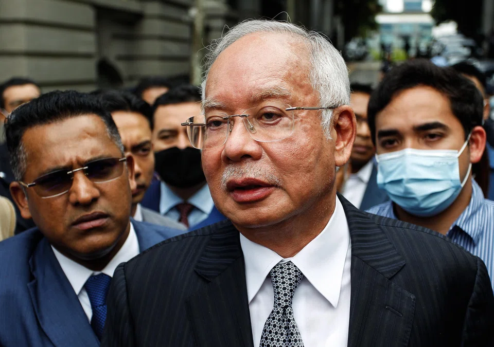 High Court judge Mohamed Zaini Mazlan said state prosecutors failed to provide sufficient evidence to prove their case that Najib Razak (above) tampered with an official audit report on scandal-wracked state fund 1MDB. 