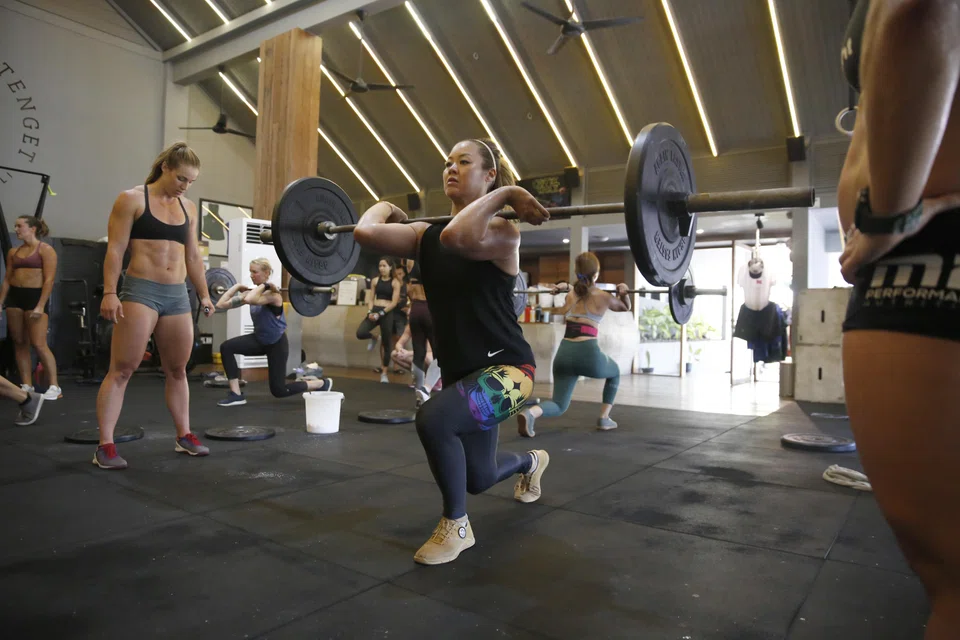 A CrossFit class in session in Singapore. Whether the death of a CrossFit Games athlete will deter other athletes from competing, or will stop casual exercisers from walking into a local CrossFit gym, remains to be seen.