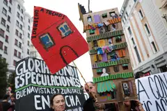People protest as they demand lower housing rental prices and better living conditions in Madrid, Spain.