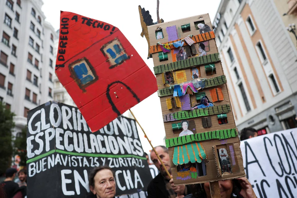 People protest as they demand lower housing rental prices and better living conditions in Madrid, Spain.