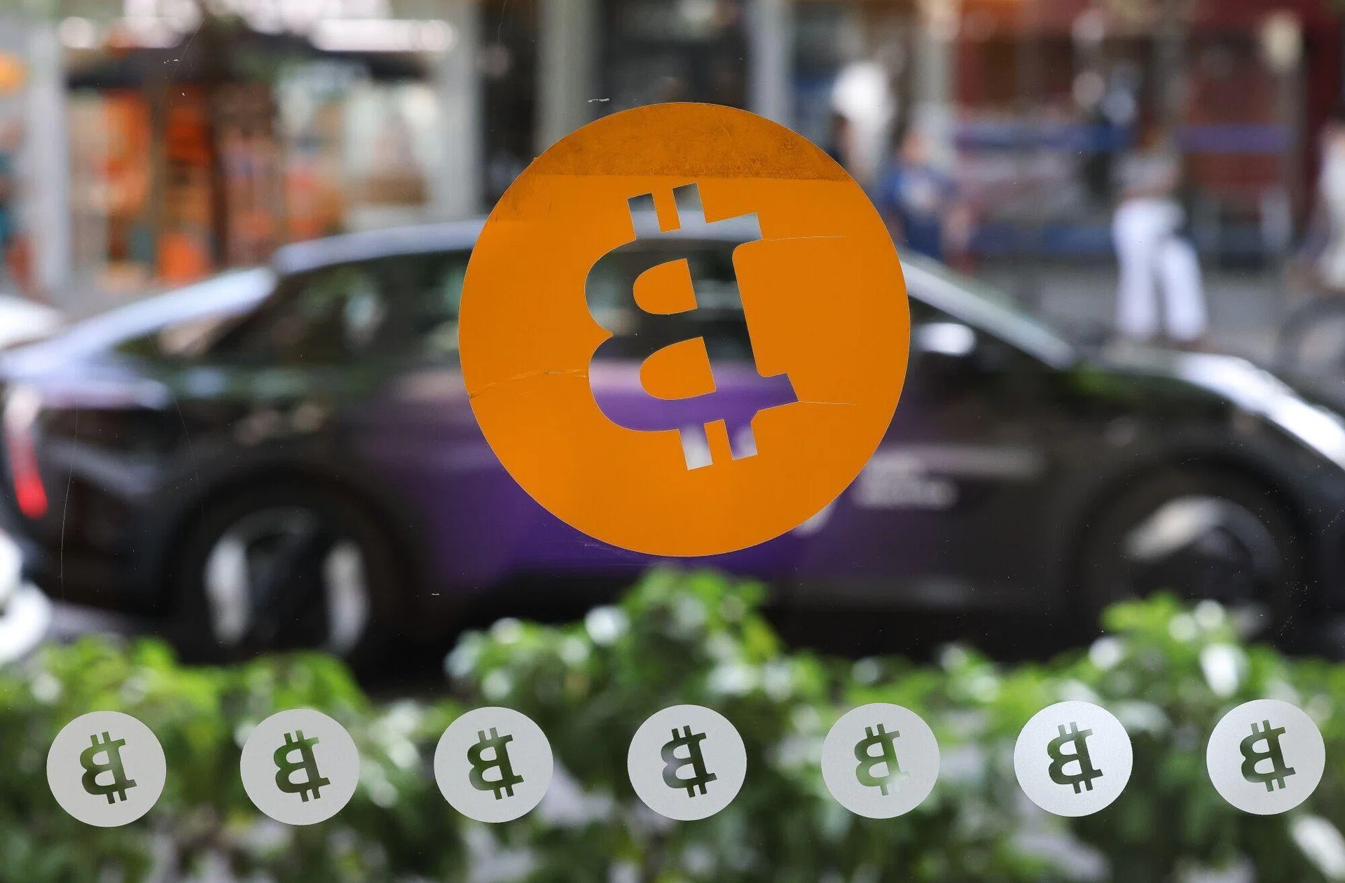 Bitcoin falls to 21-month low on strategy, rate-hike fears