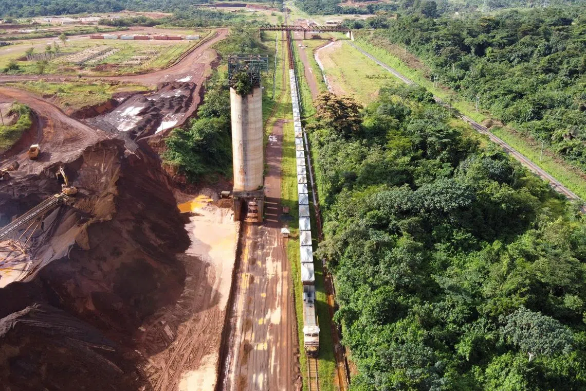 A train loaded with iron ore at the ArcelorMittal iron ore mine in Mount Nimba, Liberia, June 2021. 
