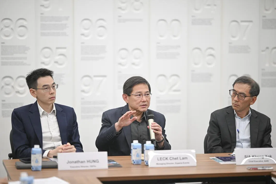 At the roundtable on Aug 28 related to the space summit are (from left): Jonathan Hung, executive director of the Office for Space Technology and Industry; Leck Chet Lam, managing director of Experia Events; Sia Kheng Yok, chief executive of the Association of Aerospace Industries (Singapore). 
