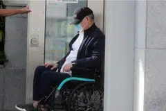 Former oil tycoon Lim Oon Kuin, also known as OK Lim, arriving at the State Courts on Apr 24. 