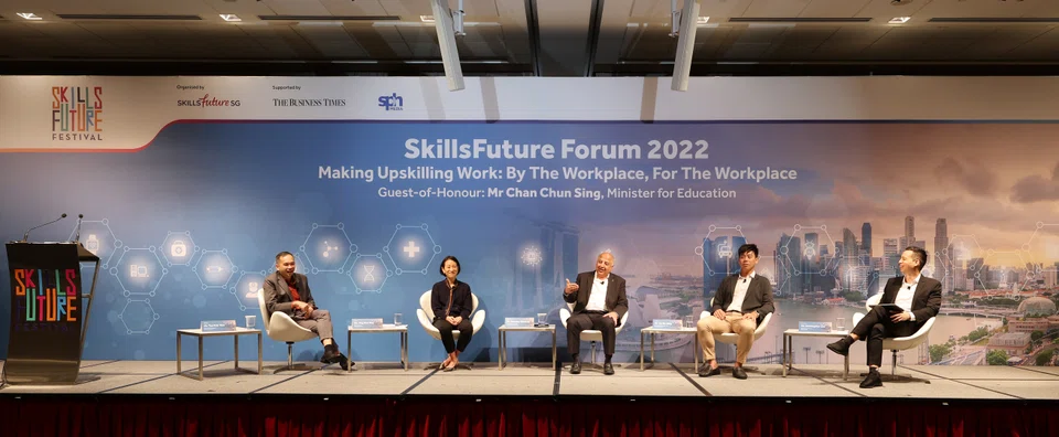SkillsFuture Forum 2022 panel discussion:. (left to right) Tan Kok Yam, chief executive of SkillsFuture Singapore; Ang Wan May, managing partner of Egon Zehnder; Manohar Khiatani, senior executive director of CapitaLand Investment; Tan Ru-Ding, managing director of Flexmech Engineering; discussion moderator Christopher Lim, digital editor, The Business Times. 