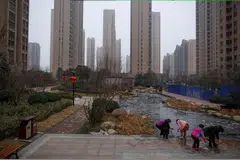 Authorities for the first time instructed local governments to buy unsold apartments through state-owned firms, facilitating up to 500 billion yuan for the purchases.