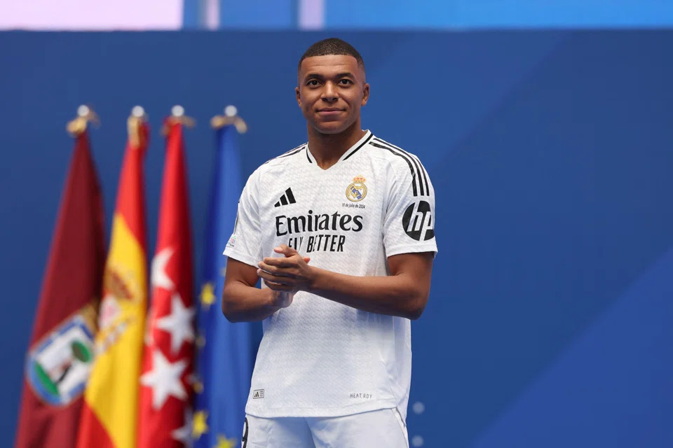 French forward Kylian Mbappe, who had completed his medical earlier on Tuesday morning, signed a five-year contract.