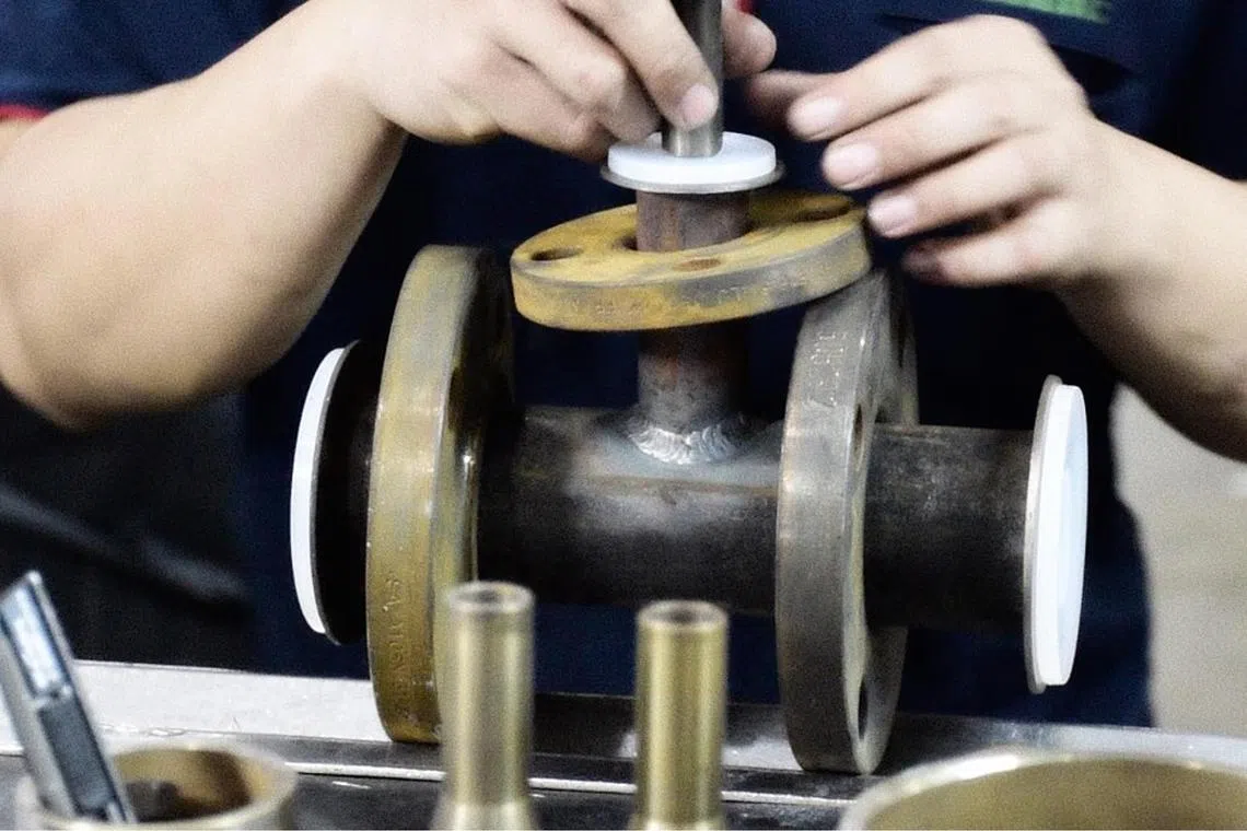 Almarc Engineering’s PTFE/PFA lined pipes are carefully inspected before being fitted into customers’ manufacturing facilities.