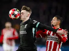 Liverpool's Conor Bradley (left) in action against PSV Eindhoven on Thursday in the final round of group games of this season's Champions League. Liverpool lost 3-2 but still topped the 36-team table.