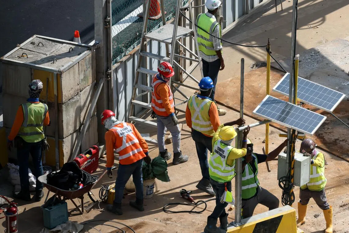 Singapore's latest population numbers – soaring to a record-high 6.11 million as at June – show that growth was driven largely by work permit holders.