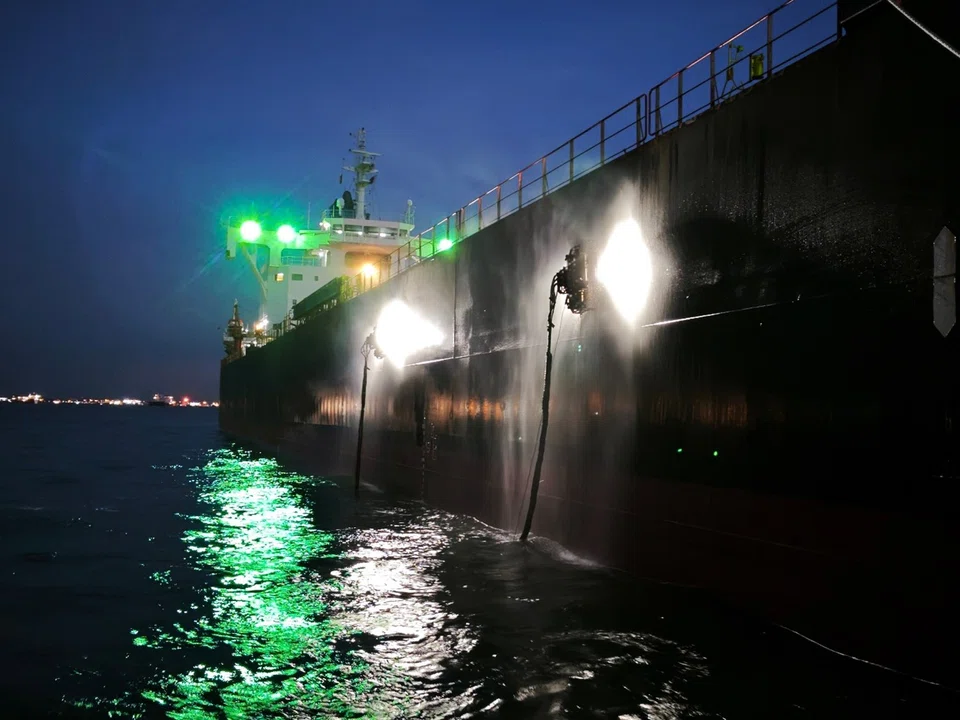 Neptune Robotics’ cleaning robots working at night.