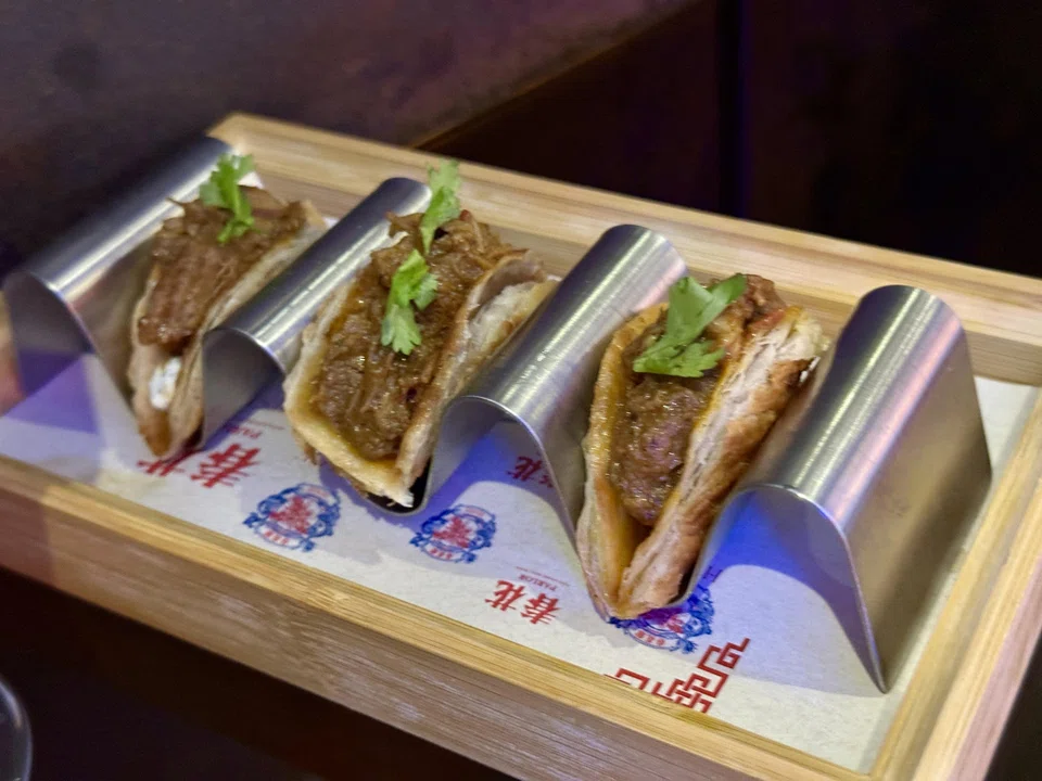 Flaky coin prata is stuffed with lamb curry.