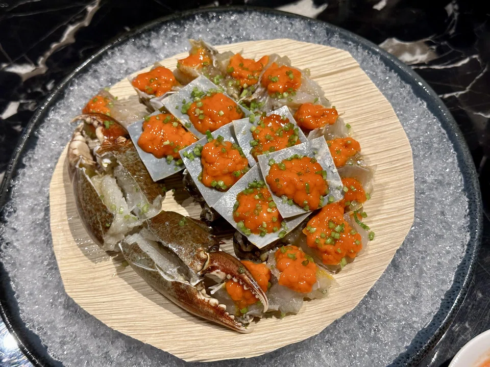 The signature raw marinated crab.