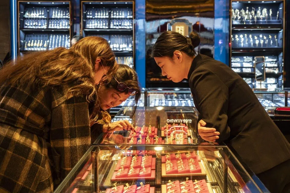 Total retail sales of consumer goods exceeded 50 trillion yuan for the first time last year, says National People’s Congress spokesperson Lou Qinjian.