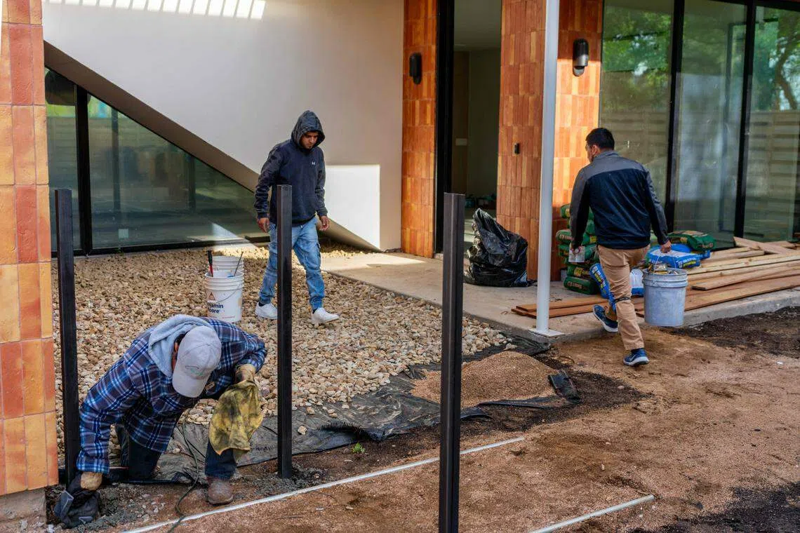 Workers renovating a house in Texas. Republican state-level policies show a political and economic agenda that rests on weakening whatever protections working people might have from their employers.