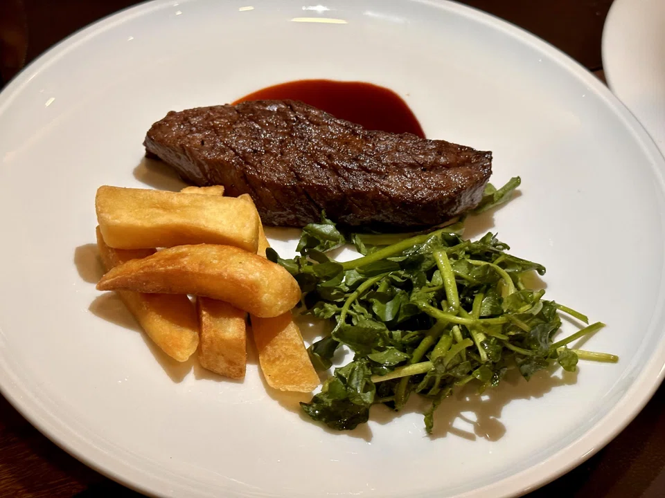 Medium rare wagyu flank steak is surprisingly tender.