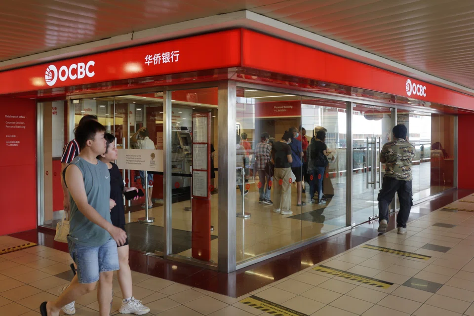 OCBC was the biggest winner, rising 2.5 per cent or S$0.37 to close the day at S$15.
