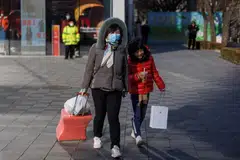 Flight passenger numbers stand at 63% of the 2019 figure before the pandemic, as Chinese return to their hometowns over Chinese New Year. 